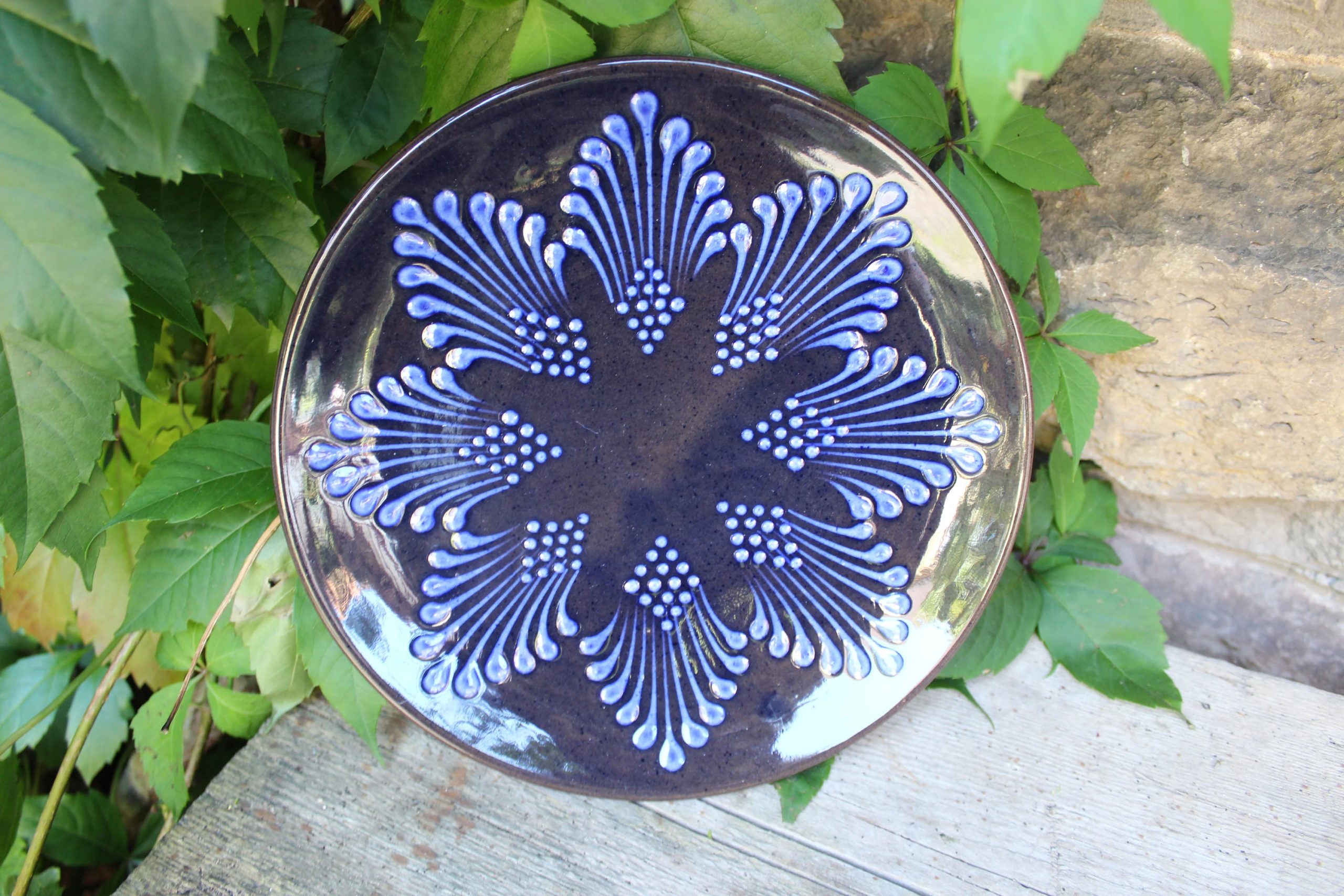 Dark brown floral art ceramic plate